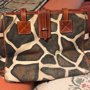 Dooney&Bourke Giraffe Print Leather Trim Handbag inside pink lining . Very nice!